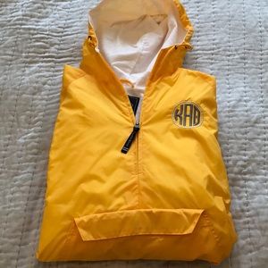 Theta monogrammed rain jacket